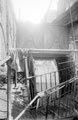 View: y01440 Waterwheel at W.A. Tyzack and Co. Ltd., scythe manufacturers, Clay Wheel Forge (also known as Hawksley), River Don at Wadsley. Photograph taken when Tyzack's were giving up the tenancy, and Messrs. Dunford and Elliott were intending to demolish work