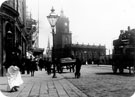 Pinstone Street showing St. Paul C. of E. Church and the construction of Stewart and Stewart, tailors, left Pinstone Street showing St. Paul C. of E. Church and the construction of Stewart and Stewart, tailors, left