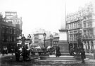 Jubilee Monolith, Town Hall Square, looking towards Fargate. Y.M.C.A.'s, Carmel House, right Jubilee Monolith, Town Hall Square, looking towards Fargate. Y.M.C.A.'s, Carmel House, right