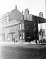 View: y01683 Beehive Hotel, No. 240 West Street at the junction with Portland Lane showing (right) the installation of a bill poster