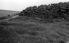 Outside Rampart of west End of Carl Wark, largest stones 5 to 6 feet, Hathersage Moor