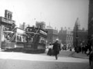 Tram Nos. 180 and 197, High Street looking towards Commercial Street including Canada House (Sheffield Gas Company offices) and Birmingham District and Counties Banking Co. (with domed roof on right). Fitzalan Market Hall on left. Tram Nos. 180 and 197, High Street looking towards Commercial Street including Canada House (Sheffield Gas Company offices) and Birmingham District and Counties Banking Co. (with domed roof on right). Fitzalan Market Hall on left.