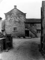 Rear of Bagshawe Arms. Steps lead to a long room, over the stone built stables, which was formerly the petty sessions court. There is a stone in the south end of the gable bearing the initials F.W.B. 1859 (Francis Westby Bagshawe)
