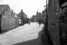 View: y02167 Gleadless village, Gleadless Road from junction with Hollinsend Road. Canopy on left belongs to W.H. Webster, butchers