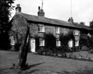 Fox Hall, Fox Lane, Bradway. Stone gargoyles over the front door are said to have come from the ruins of Beauchief Abbey. Fox family lived there