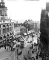 View: y02624 Elevated view of High Street looking towards Blitz damaged Montague Burton Ltd., tailors, showing Sheffield Telegraph and Star Ltd., Kemsley House