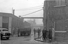 View: y02844 The morning after the fire at Mellowes and Co. Ltd., metal window manufacturer, Bridge Street