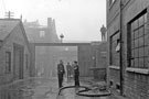 The morning after the fire at Mellowes and Co. Ltd., metal window manufacturer, Bridge Street
