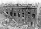 Sales and Mellwall Sections the morning after the fire at Mellowes and Co. Ltd., metal window manufacturer, Bridge Street from the Lead Mill