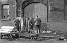 Salvage operations by the maintanance staff after the fire at Mellowes and Co. Ltd., metal window manufacturer, Bridge Street 