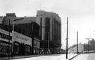 B and C Co-op (Castle House No. 1); Symington and Croft Ltd., ladies outfitters looking towards bomb damaged Montague Burton Ltd., Angel Street