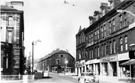 Ecclesall Road from the junction with Cemetery Road with the Midland Bank left; premises including W.E. Franklin Sheffield Ltd. and A. Shapero Ltd. right Ecclesall Road from the junction with Cemetery Road with the Midland Bank left; premises including W.E. Franklin Sheffield Ltd. and A. Shapero Ltd. right