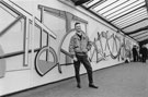 View: s27514 Mural on the footbridge at Sheffield Midland railway station, artist pictured but name not known 