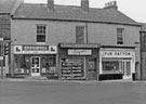 Nos. 197, Broomhill Driving School Ltd., 199, C. E. Styan Ltd., bakers and 201, F and B Hatton, butchers, Whitham Road from the junction with Newbould Lane