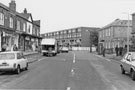 Nos. 12, H. Ferrie Chemist Ltd.; 10; 8 etc. (left) and Doctors Surgery (right), Wostenholm Road  looking towards Flats on Washington Road 