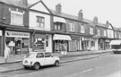 Nos. 20, United News Shops; 18, Sharrow Dairies, R. Burton Stevenson Ltd.; 16, Next Time, nearly new clothing; 14, Cedric's Hair Salon; 12, H. Ferrie Chemist Ltd. etc, Wostenholm Road 