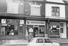 Nos. 22, Sheffield Fried Chicken; 20, United News Shops; 18, Sharrow Dairies, Wostenholm Road 