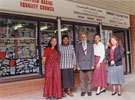 Staff outside the Racial Equality Council Community Relations Office, No. 108 The Moor