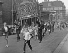 Attercliffe Whit Sing Parade including Attercliffe Baptist Sunday School walking along Shirland Lane with Midland Bank at the junction of Attercliffe Road and Baker Street in the background