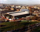 Elevated view of the construction of Ponds Forge Leisure Complex at the junction of Pond Hill and Sheaf Street with Gilbert Street Railway Bridge and Sheaf Street Footbridge in the foreground