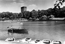 Rowing, Crookes Valley Park boating lake with University of Sheffield, Arts Tower in the background Rowing, Crookes Valley Park boating lake with University of Sheffield, Arts Tower in the background