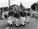 Morris dancers performing at the Grenoside Folk Dance Festival, Main Street with St. Marks Church in the background Morris dancers performing at the Grenoside Folk Dance Festival, Main Street with St. Marks Church in the background