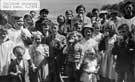 Oughtibridge. Children enjoying buns at Whitsuntide, c. 1954