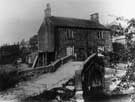 Old packhorse bridge and 2 cottages in Ewden, c. 1912 before the bridge was removed to Glen Howe in 1913 Old packhorse bridge and 2 cottages in Ewden, c. 1912 before the bridge was removed to Glen Howe in 1913