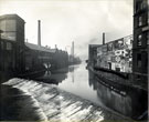 Lady's Bridge Weir, River Don from Lady's Bridge looking towards Exchange Brewery (left) and rear of properties on Nursery Street