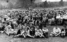 View: u07337 The 'Holidays at Home' scheme, a crowd of children watching entertainment in Endcliffe Park during World War Two.