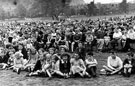 The 'Holidays at Home' scheme, a crowd of children watching entertainment in Endcliffe Park during World War Two.