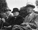 Th 'Holidays at Home' scheme, World War 2. 1943. Three elderly gentlemen watching bowls at the top green Hillsborough Park.