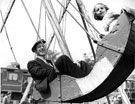 The 'Holidays at Home' scheme, World War 2.  Funfair in a local park, 1943