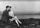 The 'Holidays at Home' scheme, World War 2.  Unidentified couple