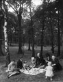 The 'Holidays at Home' scheme, World War 2.  Group having a picnic in a local park