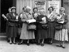 Sheffield and Ecclesall Co-operative Society Ltd, group of women standing outside the Arcade branch, 21/41 Ecclesall Road/28 Cemetery Road during a summer sale..