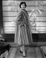 Lady modelling a fur coat from the fashion department of the Sheffield and Ecclesall Co-operative Society, unknown branch. Lady modelling a fur coat from the fashion department of the Sheffield and Ecclesall Co-operative Society, unknown branch.