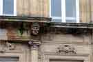 One of four carved heads on the facade of the former Barclays Bank, No. 2 High Street, now Caffe Nero. 2013