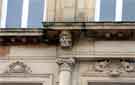 One of four carved heads on the facade of the former Barclays Bank, No. 2 High Street, now Caffe Nero. 2013