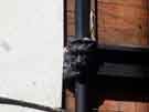Decoration on drainpipe at Hen and Chickens public house, No. 3 Castle Green