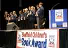 Ellie Crisell (first left) with children at the Sheffield Children's Book Award