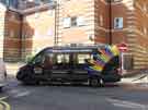 Sheffield Royal Society for the Blind minibus outside Mappin Court, No.7 Mappin Street