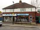 Shops on Westwick Crescent, Greenhill showing (left) All Occasions, greeting card shop, (No.1) and Martha's, cafe, (No.3) 