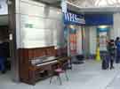 View: a03985 Piano outside W. H. Smith and Son Ltd., station concourse, Sheffield Midland railway station, Sheaf Street