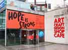 View: a04159 Entrance to the Millenium Gallery on Arundel Gate showing an advertisement for Hope is Strong, an exhibition at the gallery, February-June, 2018