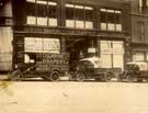 T. B. and W. Cockayne, department store, No. 1 Angel Street - Albion lorries parked in front of the store in Angel Street, c. 1920