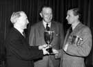 Presentation by Richard Sparling of a Sheffield cup to Charles Hughes of Hallamshire Golf Club