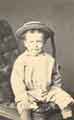 E. Fawcett, a young male child, thought to be Ernest Dixon Fawcett (1868 - 1935), eldest son of James Dixon Fawcett (1844 - 1900) and Eliza Martha Fawcett (nee Wightman, known as 'Lily') (1844 - 1906), ealry 1870s