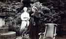 Probably Annie Maud Wightman (1854 - 1940) and Edith Wightman (1850 - 1943) [sister and wife respectively of Arthur Wightman (1842 - 1924)] standing by sundial at Lady Bower House