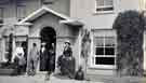 Arthur Wightman (1842 - 1924) with friends outside unidentified house